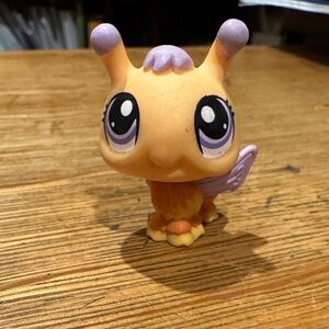 Adorable Orange and Purple Small Pet Figurine